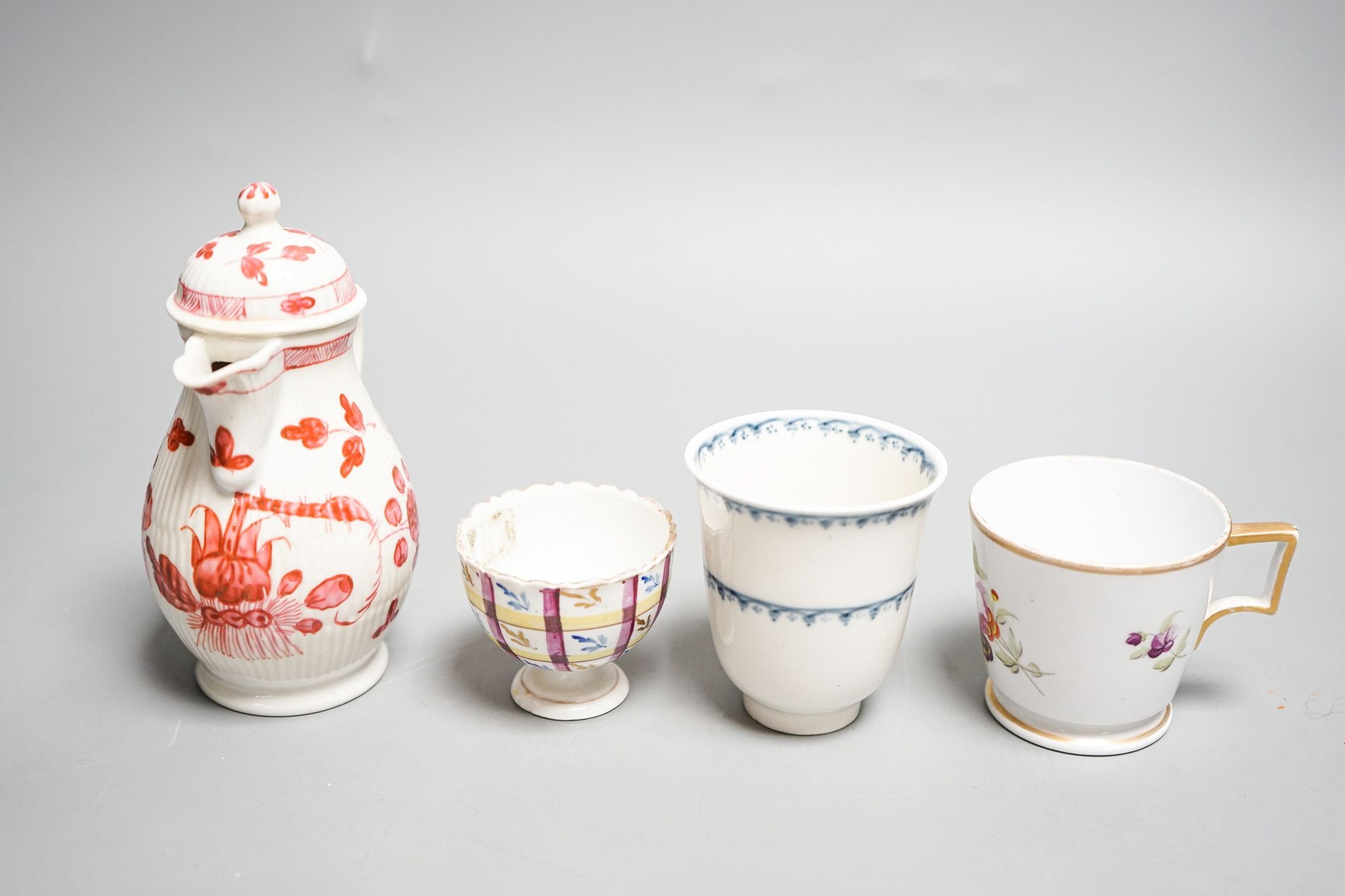 A Vienna chocolate cup, c.1760, a Tettau reeded covered jug c.1790, 13.5cm, a Volkstedt zarf cup for the Ottoman market c.1780 and a German porcelain coffee cup 14cm